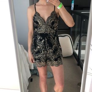 Black and gold romper